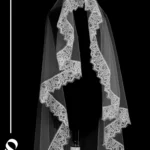 تور سر عروس دانتل کد 637 1 تور سر عروس دانتل کد 637 با ارتفاع 150 سانتیمتر و لبه دوزی کار شده